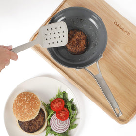 Calphalon Edge taupe turner pairs with nonstick pans for gentle flipping of foods