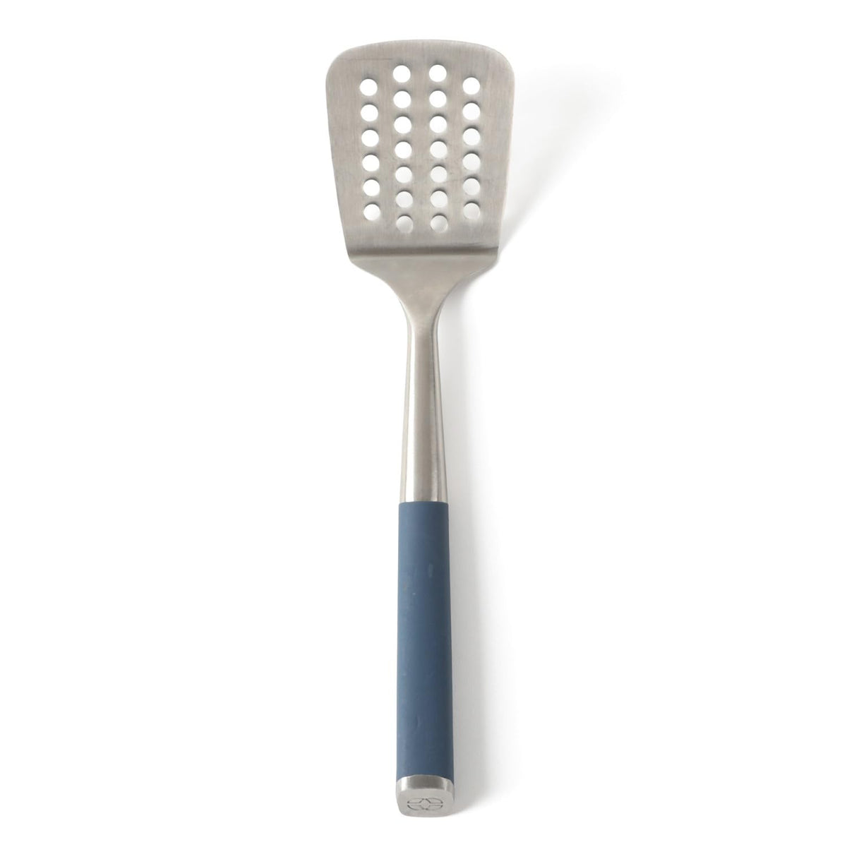 Calphalon Edge slotted turner with navy handle for precise flipping and drainage.