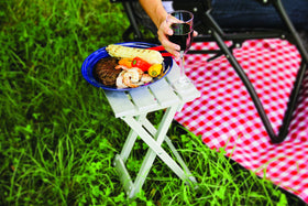 Camco small side table assembled as a sturdy surface for camping or picnics