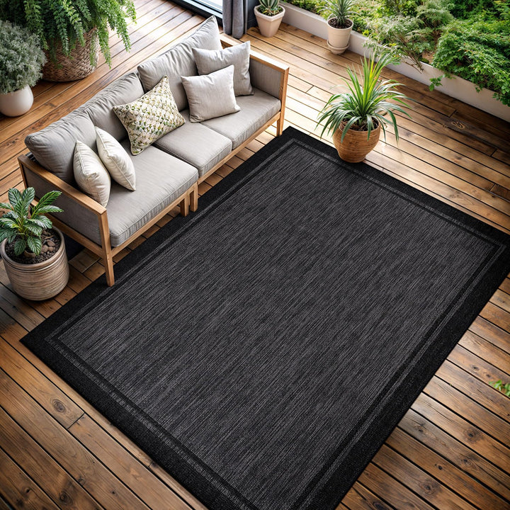 CAMILSON bordered-black-9x12 indoor-outdoor rug, easy to clean for porch and patio.