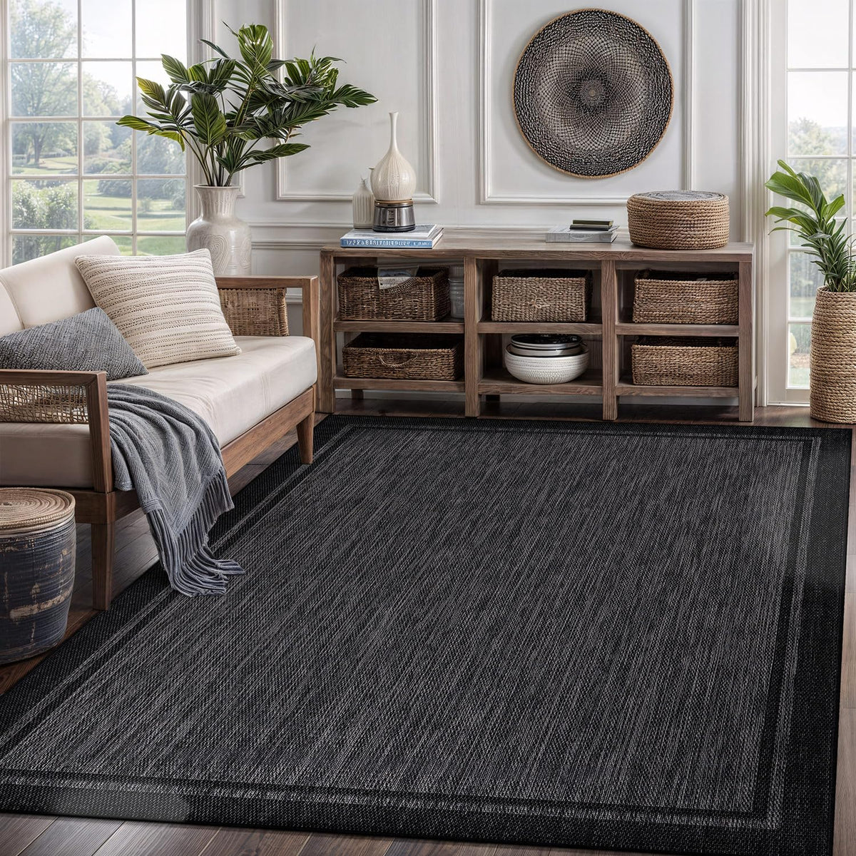 CAMILSON lightweight-border-9x12 rug, easy to reposition on patios.