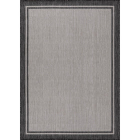 CAMILSON outdoor patio rug resists spills for easy curbside cleanup.