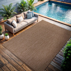 CAMILSON outdoor rug 8x10 black suits modern decks while being stain resistant