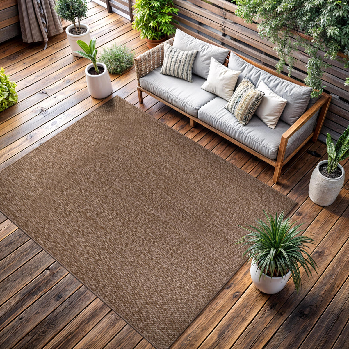 CAMILSON outdoor rug 8x10 deck-side setting demonstrates weather-friendly durability