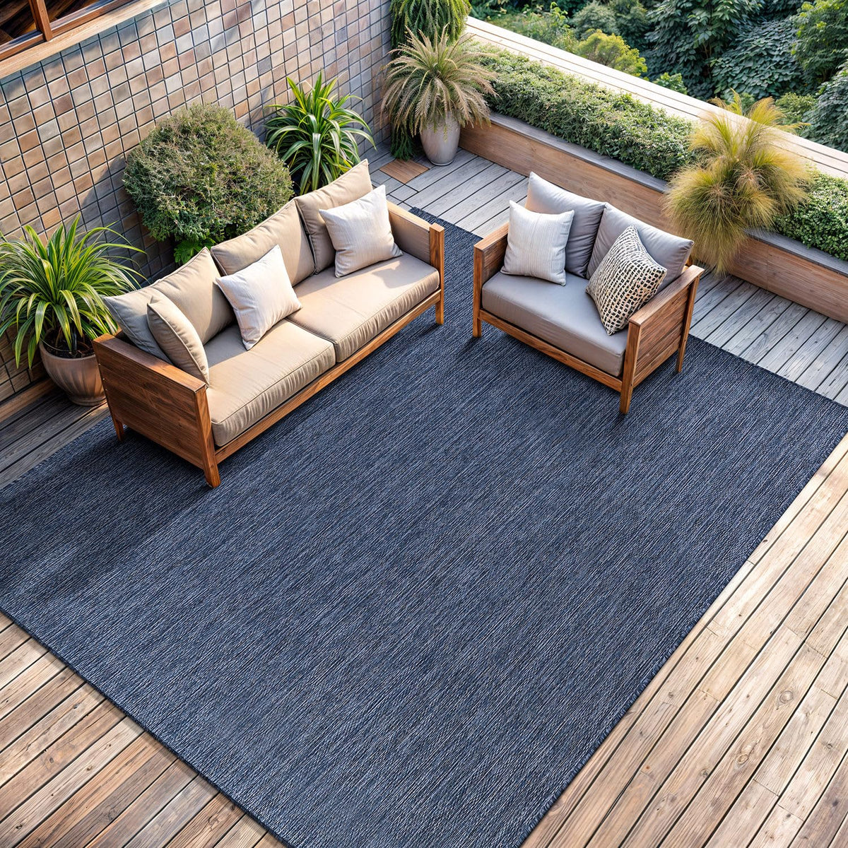 CAMILSON navy 5x7 rug from Turkey, quality you can rely on outdoors.
