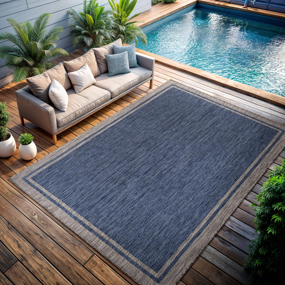 CAMILSON outdoor rug navy gray tone complements contemporary patios.