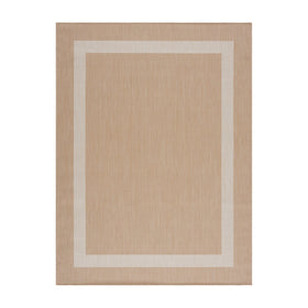 CAMILSON outdoor rug on patio setting, adding style and practicality.