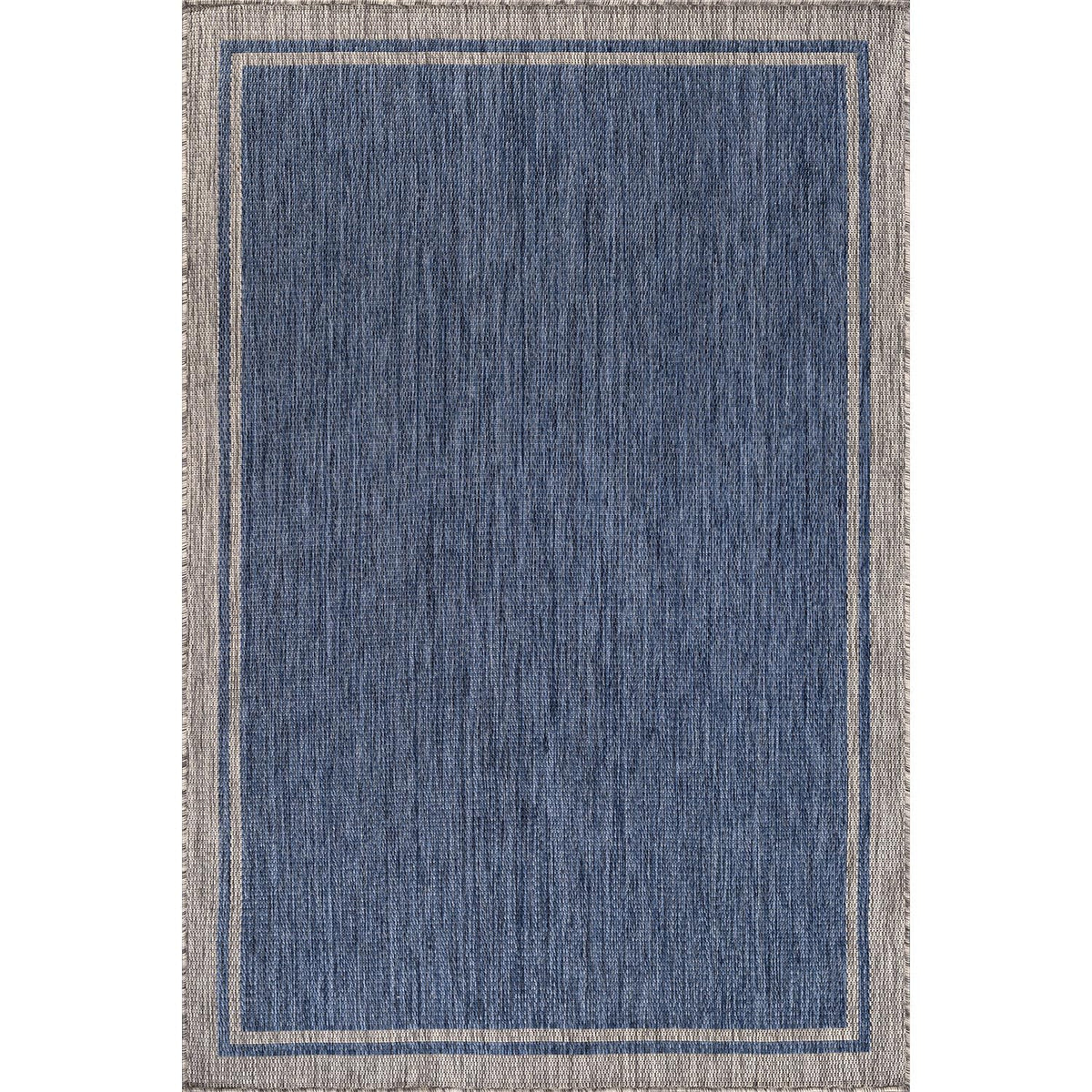 CAMILSON outdoor rug patio setup shows modern vibe and easy cleaning.