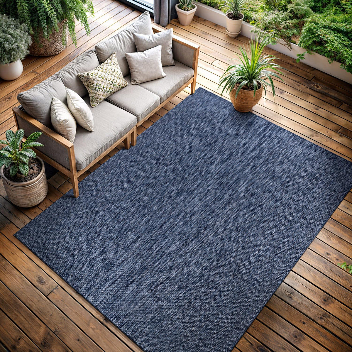 CAMILSON 5x7 navy rug, indoor-outdoor versatility for patio and living room.