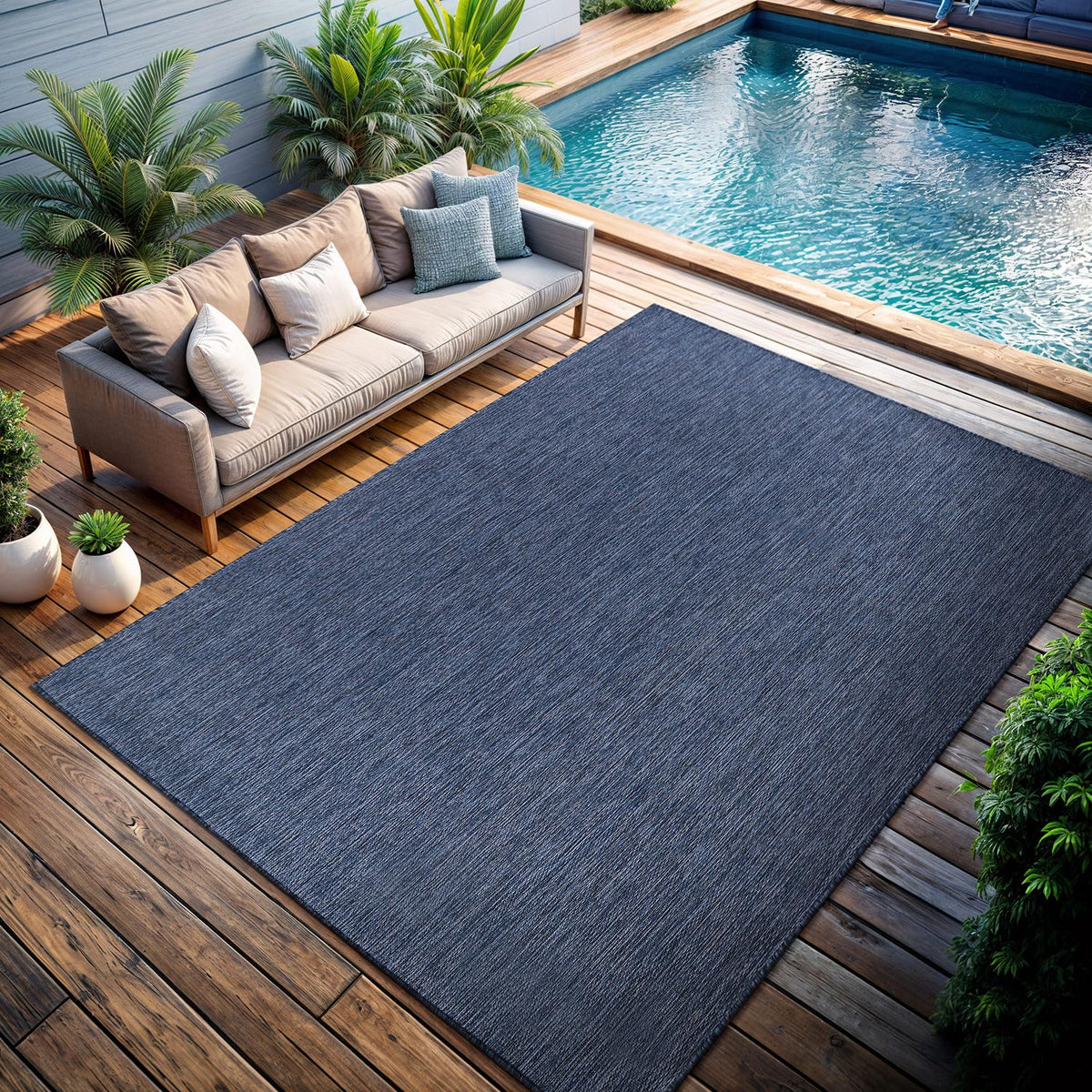 CAMILSON 5x7 navy rug, washable after spills from outdoor meals.