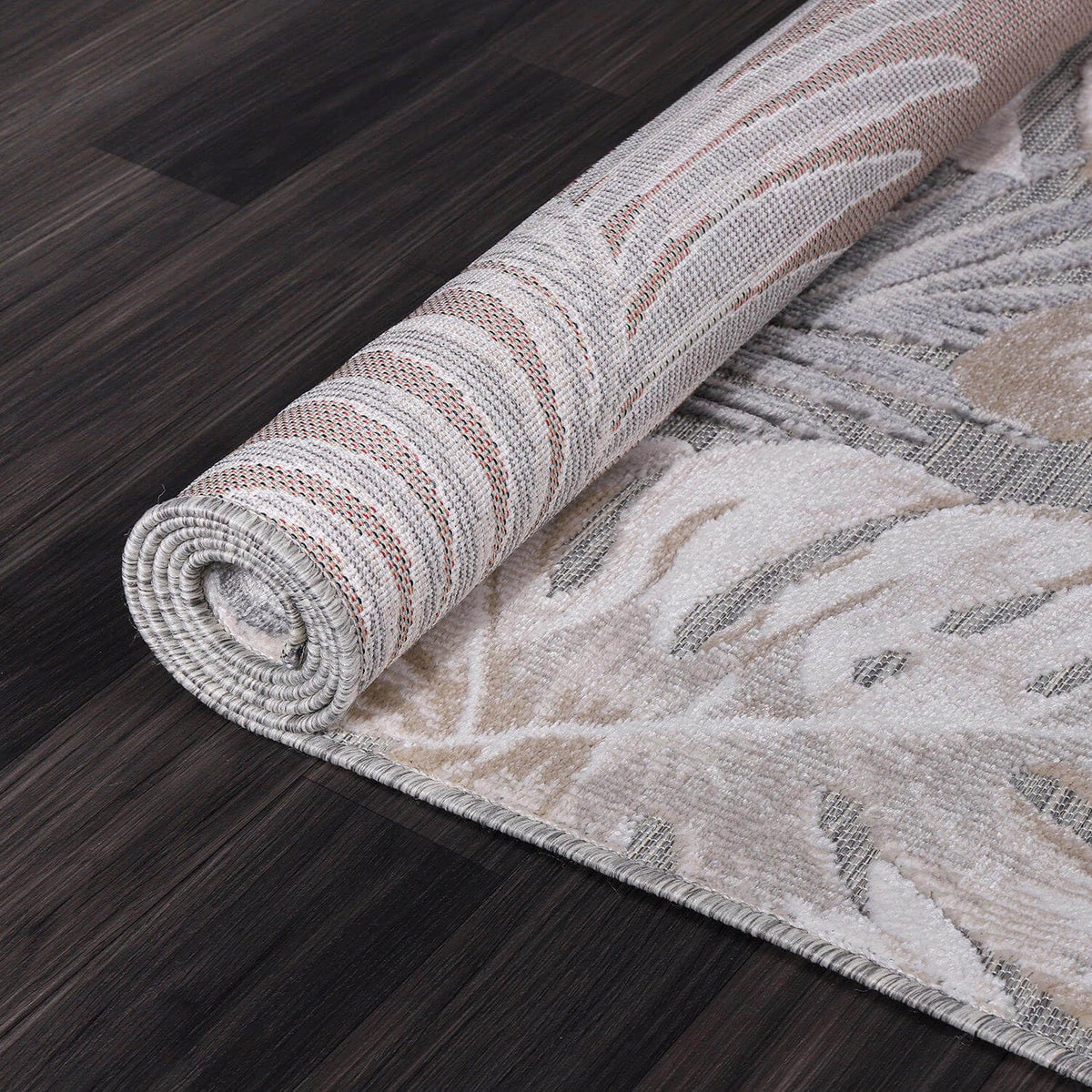 CAMILSON flat-weave rug outdoors under sun illustrates durability and low snag risk.