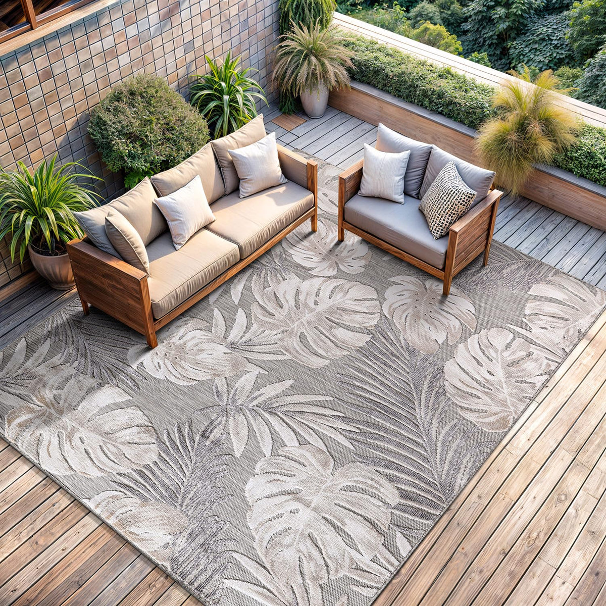 CAMILSON indoor-outdoor rug in beige leaf pattern showcases durable flat weave for 6x9 space.