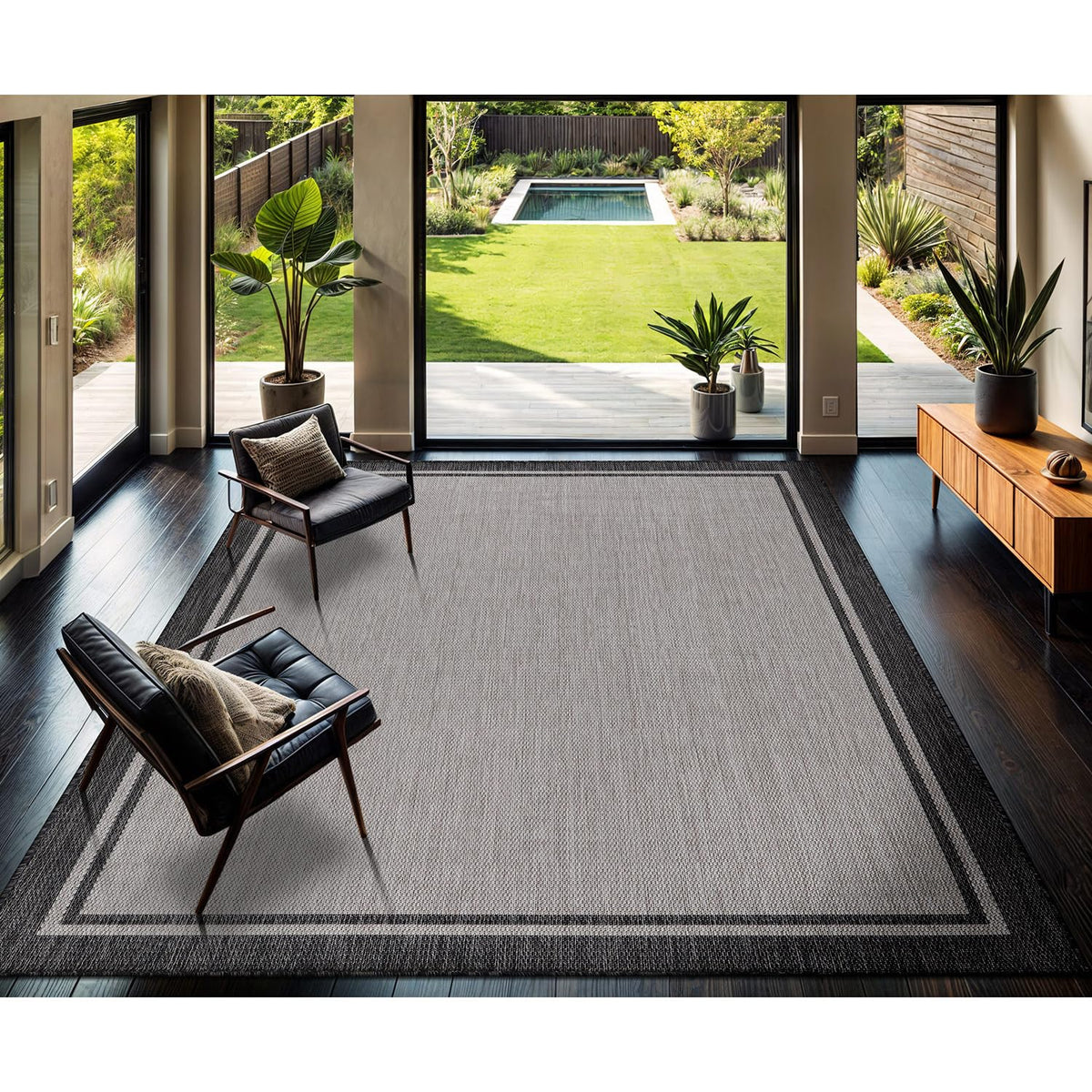 CAMILSON Turkish-made bordered grey rug emphasizing craftsmanship and durability.