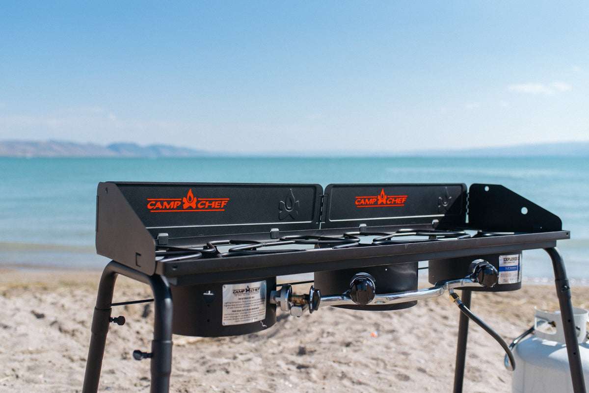 Camp Chef Explorer 3X burner detail showing precise heat control for simmer to high heat.