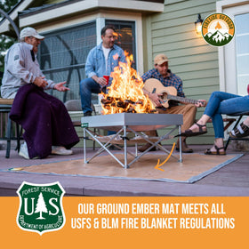 Campfire Defender outdoor firepit mat in use beside a grill