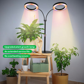 Urban gardening with Canvage dual-head LED lamp for compact spaces.