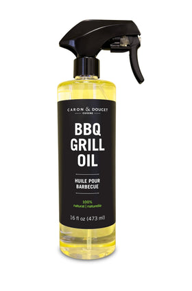 Caron & Doucet BBQ cleaner oil bottle shows plant-based formula for safe grill cleaning