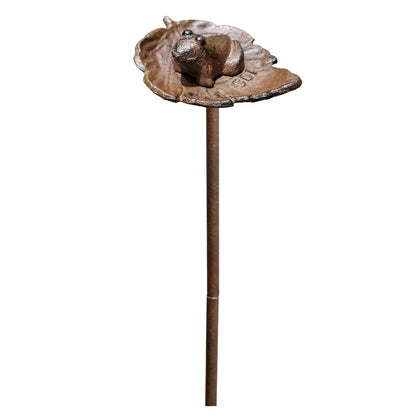 Carvers Olde Iron frog hose guide stake directs hoses around flower beds.