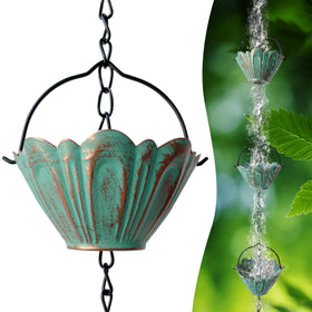 CBAXEAXM rain chain outside with bronze finish guiding rainwater gracefully.