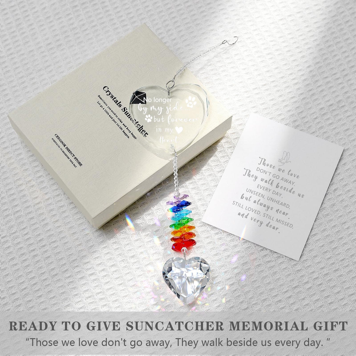 Ceegook suncatcher features engraved paw and message to memorialize a furry friend.