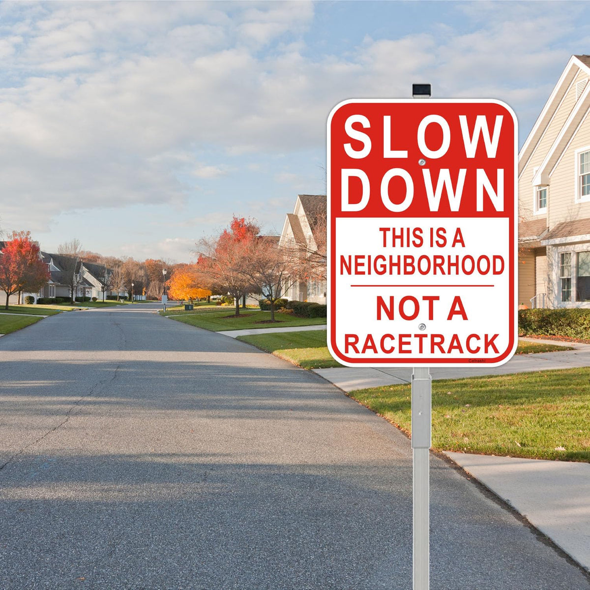 Cefrashi Slow Down sign with reflective aluminum finish improves visibility at dusk.