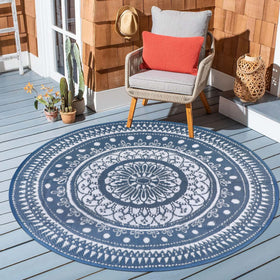 Cekene foldable outdoor rug stored compactly after use.