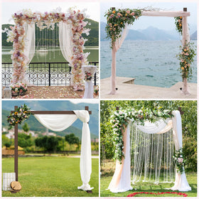 Chamvis wooden arch set up on lawn as outdoor backdrop.