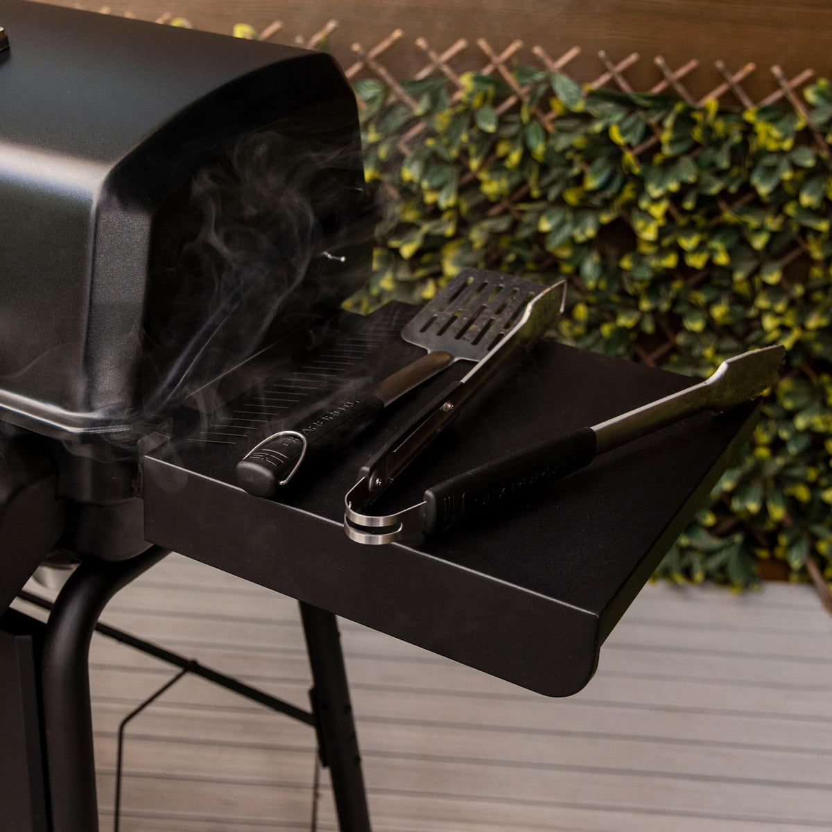 Charbroil Classic 2-Burner porcelain-coated steel lid and firebox withstand weather