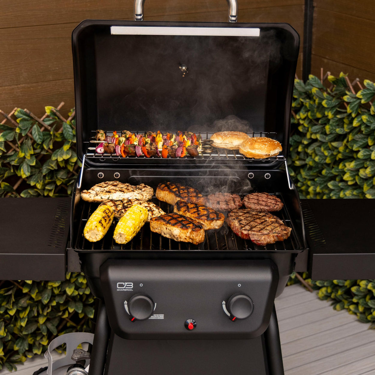 Charbroil Classic 2-Burner warming rack enables indirect cooking and keeping warm