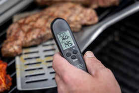 Charbroil thermometer shown folded for compact storage and easy transport.