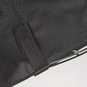 Char-Broil Kettleman cover closure straps keep the cover secured during storms