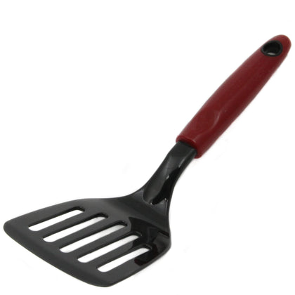 Chef Craft Select nylon short turner with red handle flipping pancakes.