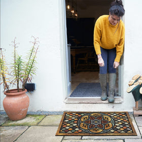 CHICHIC easy-clean doormat that sweeps or hoses clean quickly