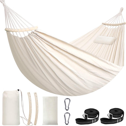 Chihee hammock laid out in sunny backyard for comfortable relaxation.