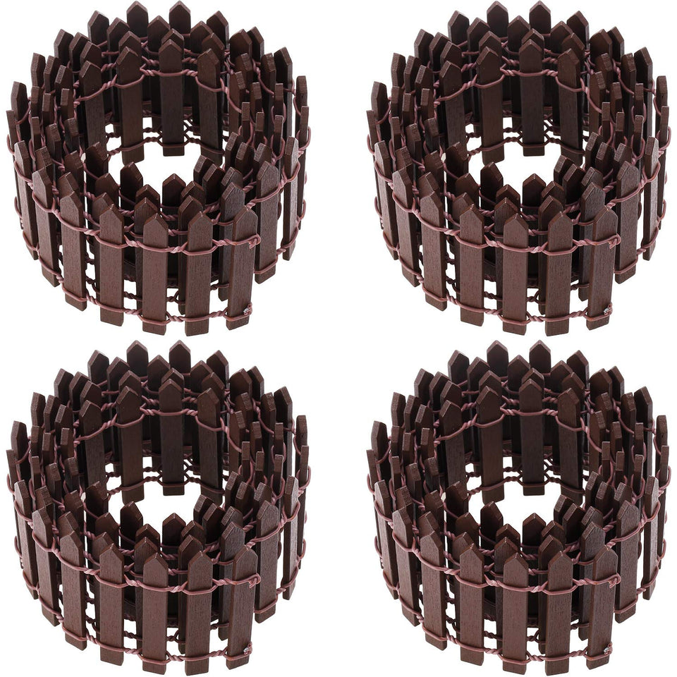 Chinco fairy garden fence four-piece wood picket set shown in a miniature landscape