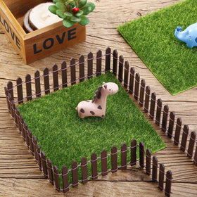 Chinco fence color red adds a vibrant touch to a dollhouse scene
