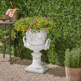 Close up of Christopher Knight Home Adonis Roman Chalice Planter lion detail