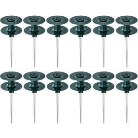 Chumia 10-inch hose guide spike planted in soil keeping hoses away from flower beds