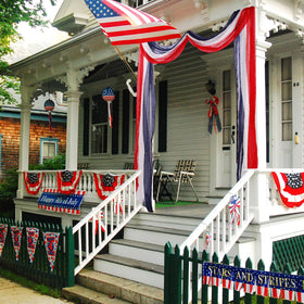 Chumia porch decor draped on fence enhances holiday atmosphere.