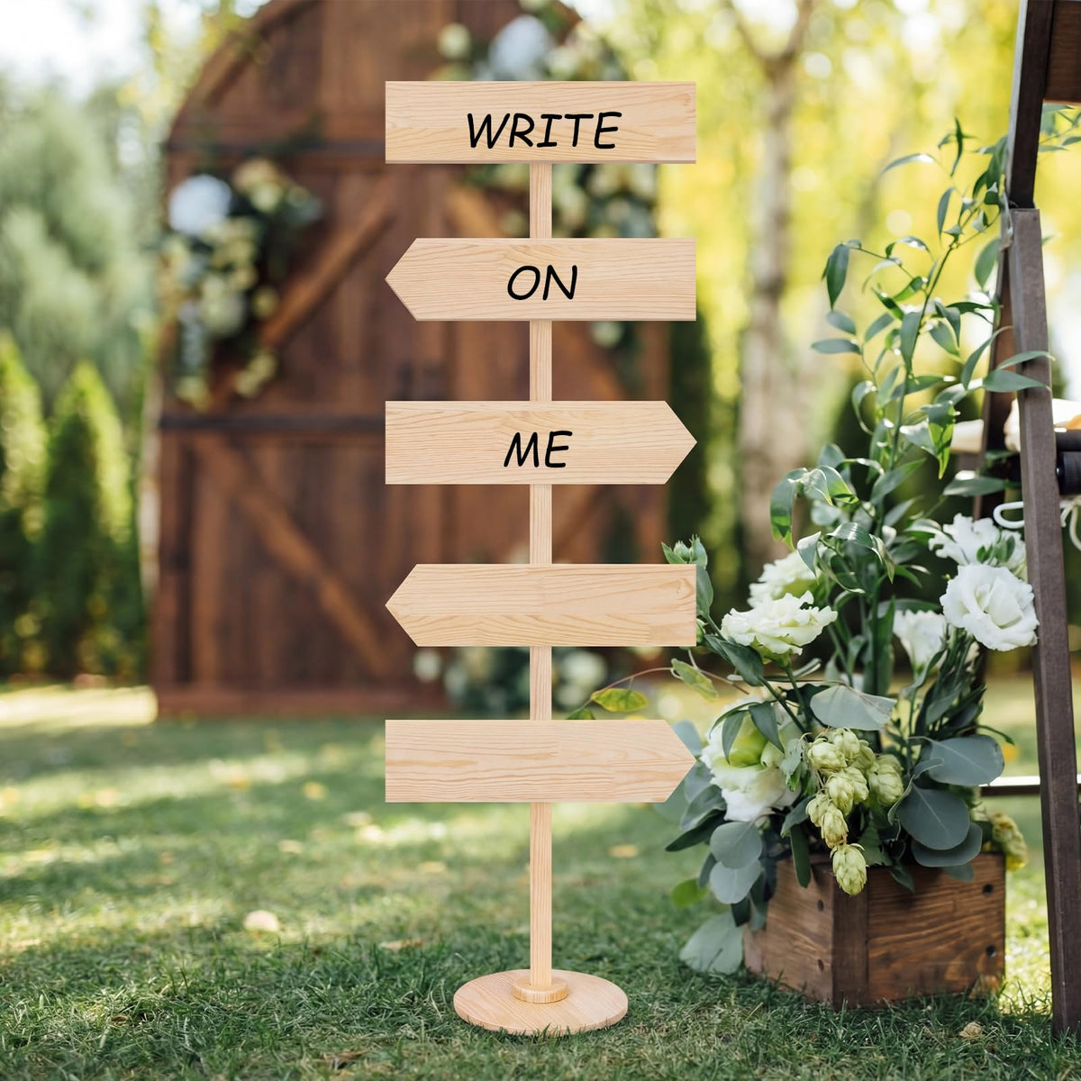 Chunful arrow sign set on stakes guiding guests at open houses.