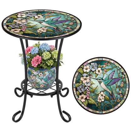 Cinnvoice hummingbird-style two-tier round outdoor table with mosaic top for plants.