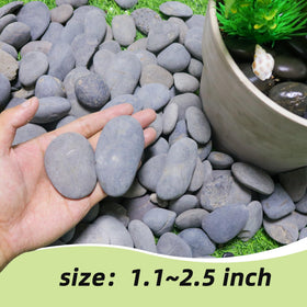 CJGQ 18lb river rocks in a garden path offer durable natural accents.