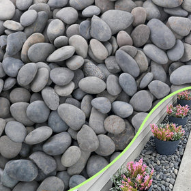CJGQ 18lb river rocks in a plant pot add tidy, decorative texture.