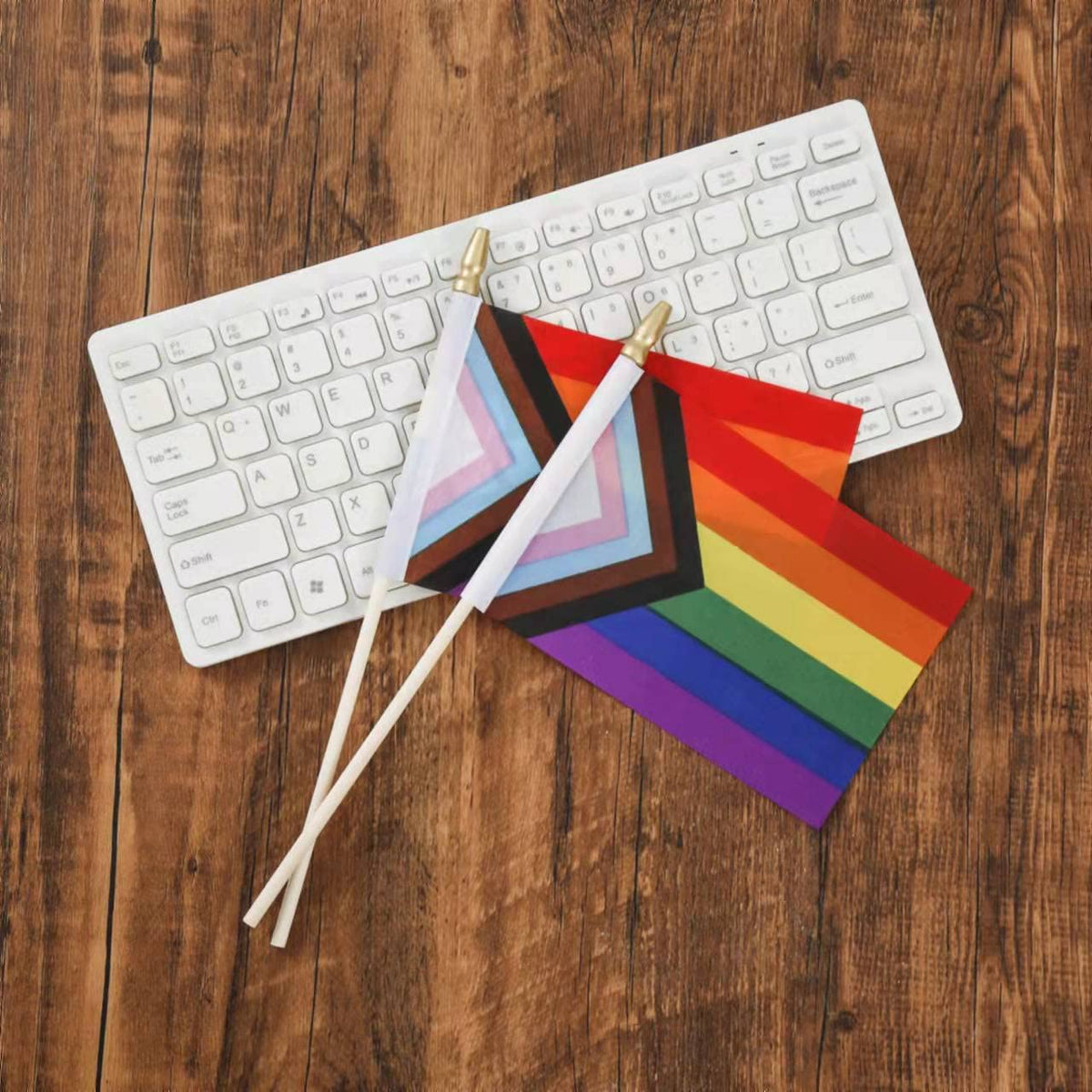 CKexin desk flag for Pride events and gifts, compact yet visibly decorative.