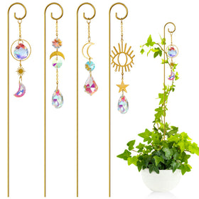 ckujjui crystal sun catcher stand reflecting light on a small potted plant
