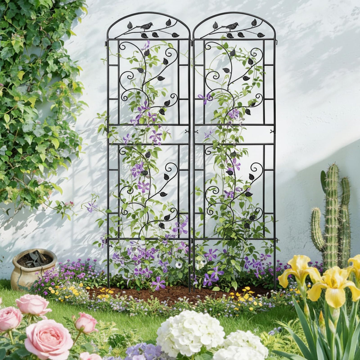 Roses, clematis, and grapevines climb the bird-vine trellis with style.
