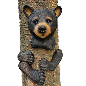 Claratut Bear Tree Peeker left foot detail for durable garden display