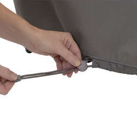 Click-close straps stabilize Ravenna cover on windy days