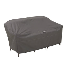 Classic Accessories Ravenna cover with windLock system shields the 76-inch loveseat from gusts.