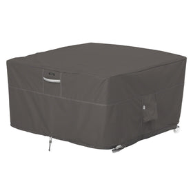 Classic Accessories Ravenna 42-inch square fire pit cover protecting a round-pated square table from rain and debris